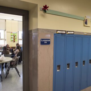 View into a classroom from a hallway in a public school