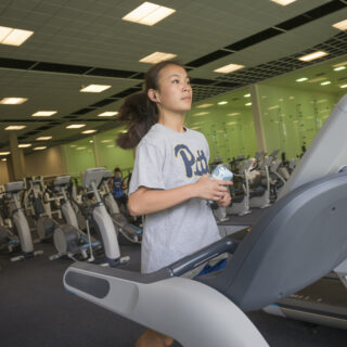 Girl running on a treadmill