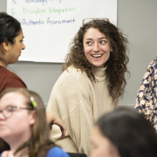 Students interacting together in the classroom