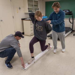 People doing an exercise science measurement activity