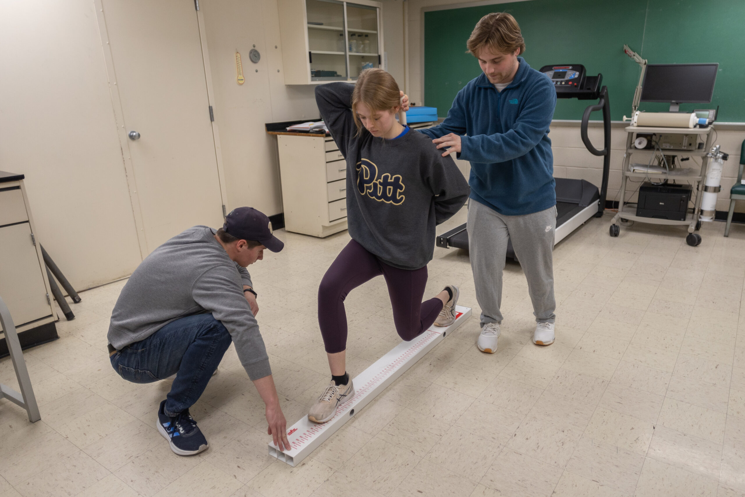 People doing an exercise science measurement activity