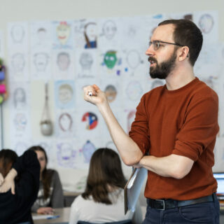 Student teacher presenting a lesson in a middle school classroom