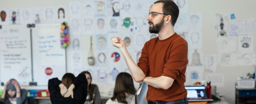 Student teacher presenting a lesson in a middle school classroom
