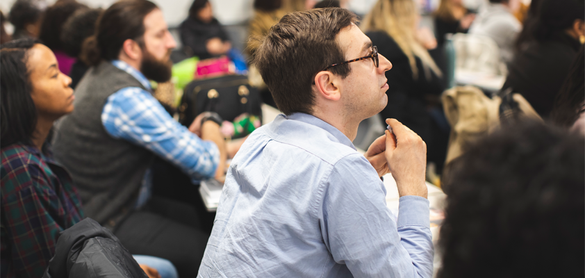 PhD student learning in classroom