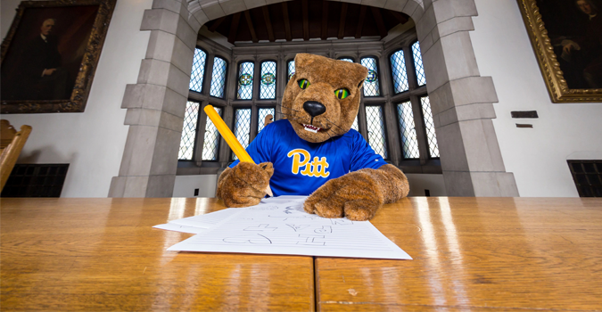 Roc the panther signing documents