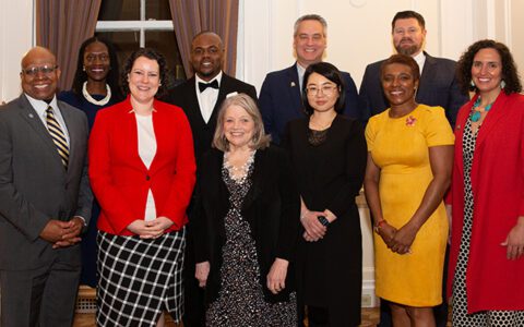 Group of nine Alumni Award winners with Dean Valerie Kinloch