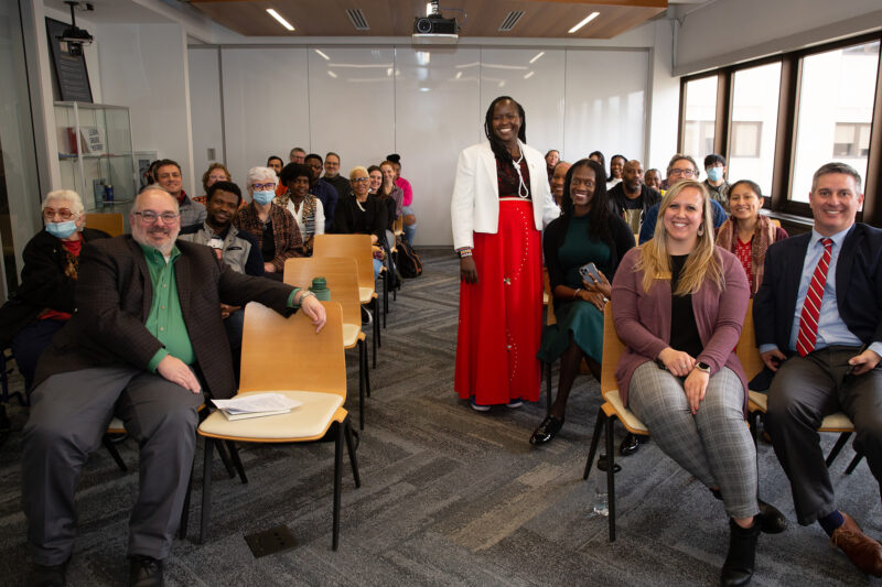 Alumna Kakenya Ntaiya poses for a photo with audience members after she presented a talk