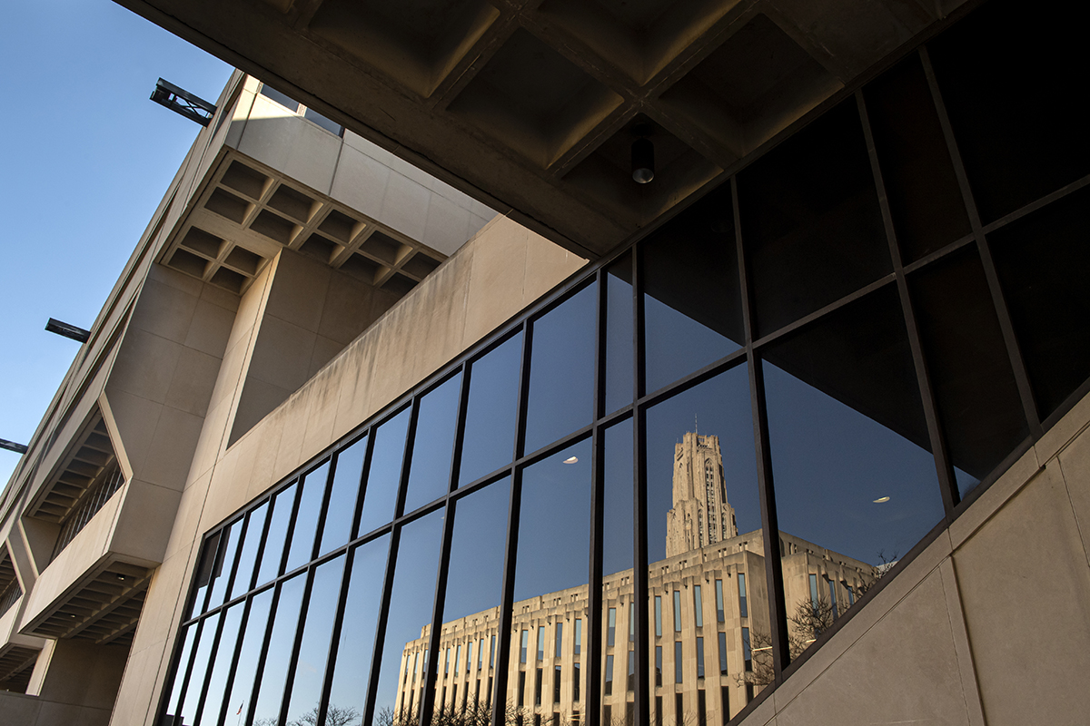 Cathedral of Learning reflected on Posvar Hall windows