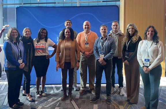 EdD and principal certification students pose for a photo with Visiting Assistant Professor Tom Ralston at the Innovative Schools Summit in Chicago in November.