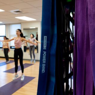 Students doing a yoga class at Pitt