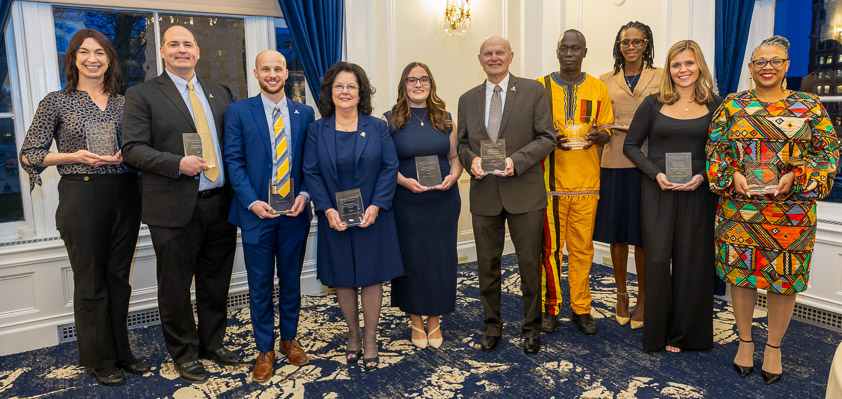 A group photo of 20205 Distinguished Alumni Award Recipients, as well as 2023 Recipient Silver Francis Oonyu