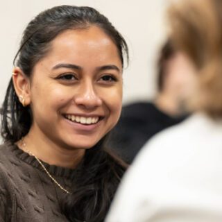 A smiling student who is benefiting from mindfulness practices