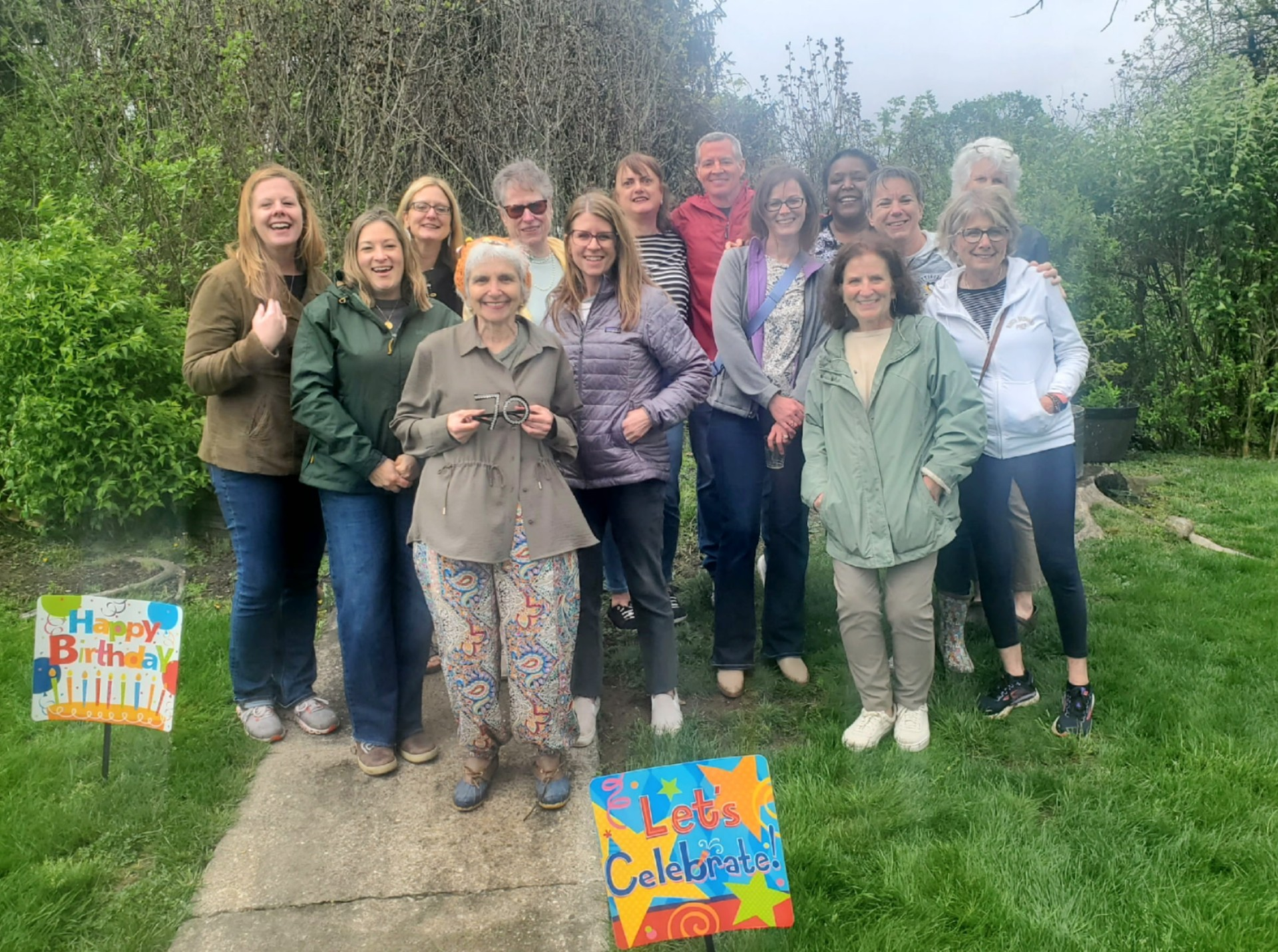Denise Esposto poses for a photo with a group of many of her former students and mentees, now employed as Child Life Specialists.